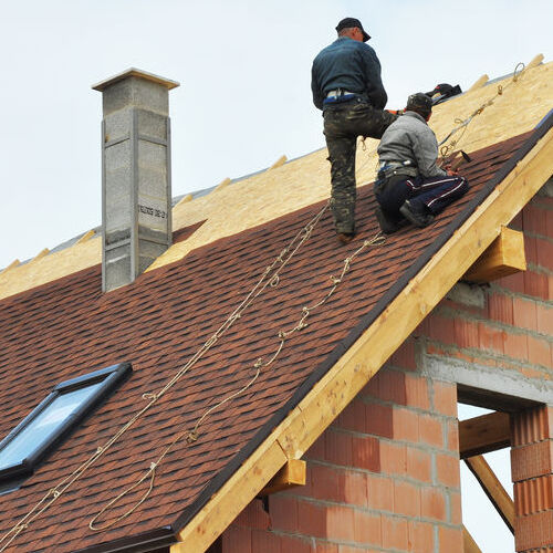 Roofers Work on Residential Roofing.