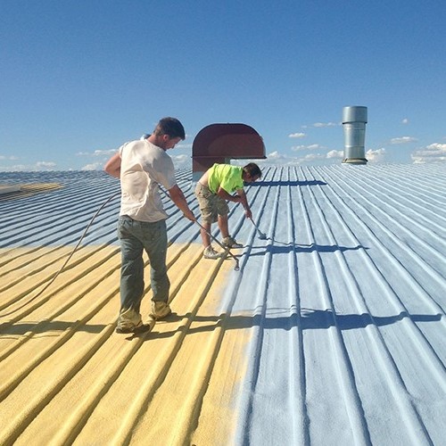 Contractors Apply a Commercial Roof Coating