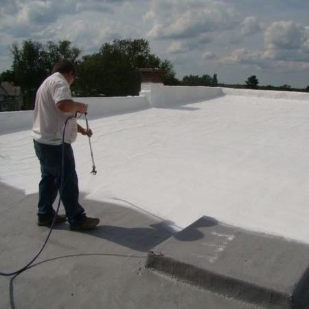Roofer Applying a Roof Coating.