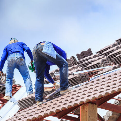 Roofers Install Spanish Tile Roofing