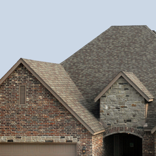home with a gray shingle roofing system